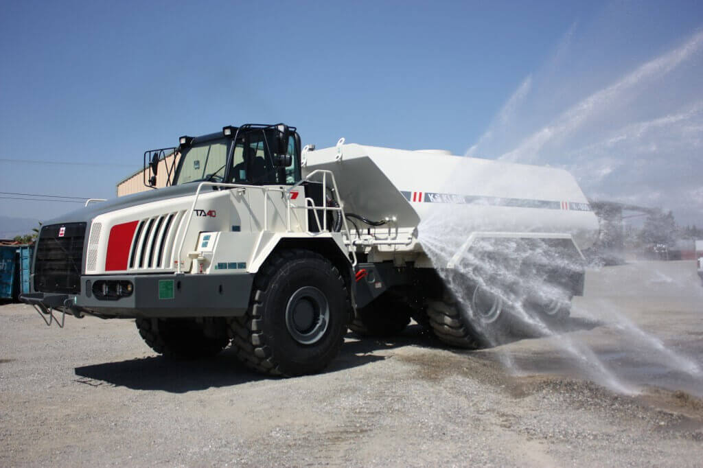 Klein Products Inc 8,000 gallon tank Terex TA40 articulated truck